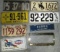 LOT OF 7 LICENSE PLATES AND 1 COVER
