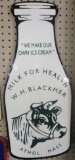 W.H. BLACKMER ADVERTISING SIGN