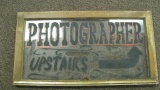 HAND PAINTED SIGN ON GLASS WINDOW