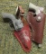 2 SMALL TOY HOLSTERS WITH GUNS