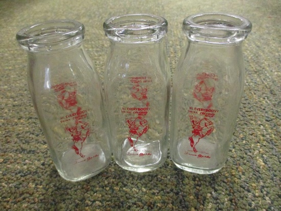 3 VINTAGE ANNIE OAKLEY MILK BOTTLES