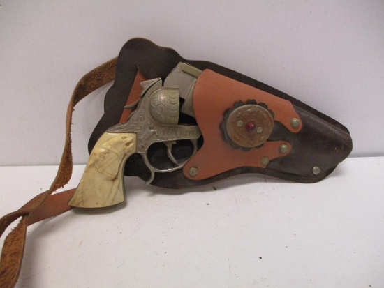VINTAGE TOY HOLSTER WITH GENE AUTRY TOY GUN