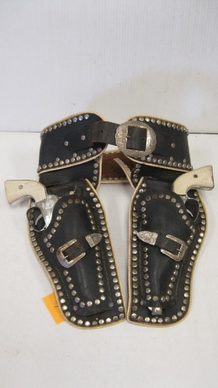 HOLSTER AND 2 CAP GUNS