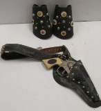 LOT OF HOLSTER AND CUFFS