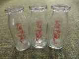 3 VINTAGE ANNIE OAKLEY MILK BOTTLES