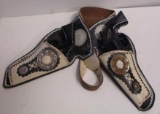 CHILDS HOLSTER AND TOY GUNS