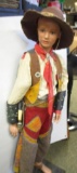 CHILD SIZE DOLL DISPLAY WITH GENE AUTRY ITEMS