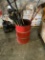 Barrel Filled with Shovels, Rakes, Brooms, Spreaders, Crow bars