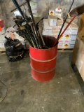 Barrel Filled with Shovels, Rakes, Brooms, Spreaders, Crow bars