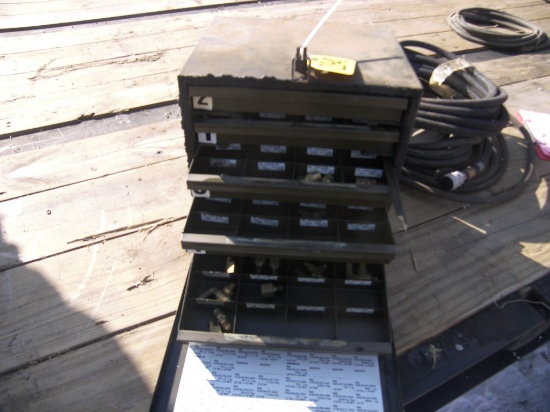 Cabinet of Brass Fittings