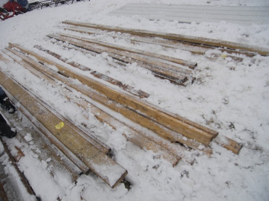 pile of 2inch x 4inch boards
