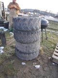 Four 10-16.5 Tires & Rims