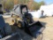 NH LX 465 Skid Steer w/Bucket