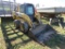 JD 325 Skid Steer