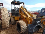 Wrangler Articulate Diesel Loader w/QT Bucket