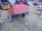 Pull behind dump cart