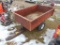 Pull behind dump cart