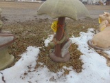Concrete frog with umbrella