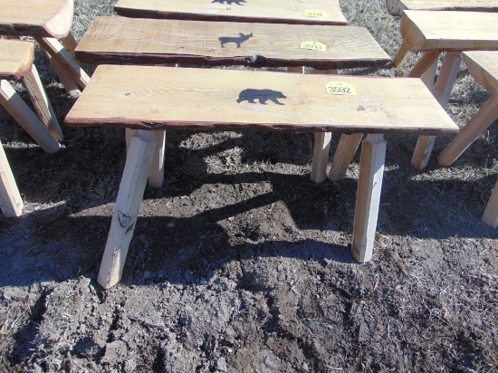 Wood bench with bear