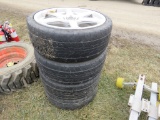 4  tires and alum rims 225/352R19