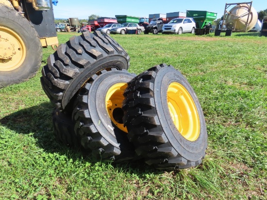 (4) 12-16.5 Tires and 8hole Rims