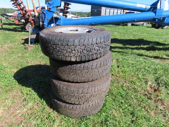 (4) 245/75R17 Tires and 8 hole Rims