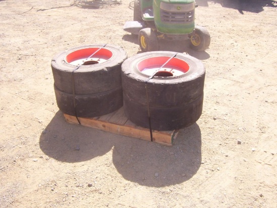 (4) Solid Skid Steer Tires.