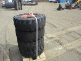 Pallet of (4) 10-16.5 Tires and Rims.