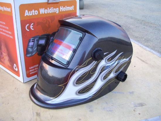 Unused Auto Darkening Welding Helmet.