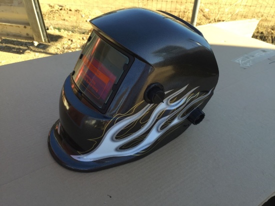 Unused Auto-Darkening Welding Helmet.