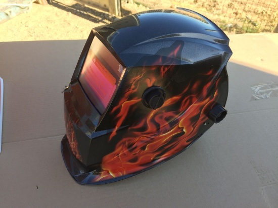 Unused Auto-Darkening Welding Helmet.