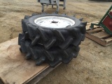 (2) Bridgestone 8.3/8-20 Tractor Tires & Rims.