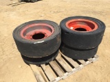 (4) Solid Skid Steer Tires & Rims.
