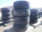 (4) Unitrac 12-16.5 Skid Steer Tires and Rims.