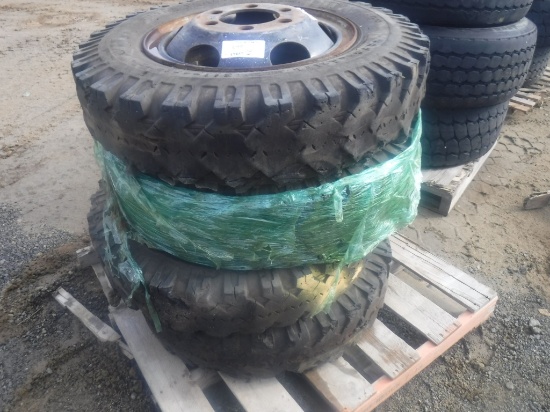 (4) B.F. Goodrich Tires 8.25-20  & Rims.