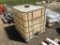 250 Gallon Plastic Container in Cage.