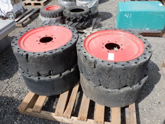 (4) 33x12-20 Solid Tires & 8-Lug Rims.
