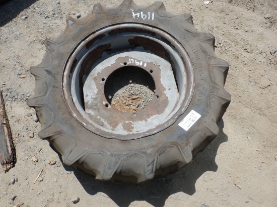 Firestone 11.2-24 Tractor Tire & Rim.