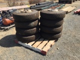 (8) 8.25-15 16 Ply Tires & Rims.