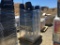 Stack of Metal & Hard Plastic Stackable Chairs.