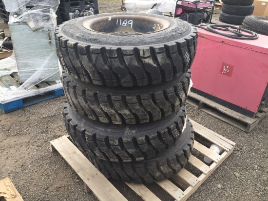 (4) Misc 345/9.75/18 Tires and 8-Lug Rims.