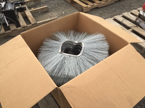 Box of Caterpillar Sweeper Brushes.