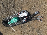 Bundle of Unused Hydraulic Hoses.