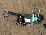 Bundle of Unused Hydraulic Hoses.