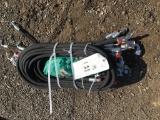 Bundle of Unused Hydraulic Hoses.