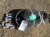 Bundle of Unused Hydraulic Hoses.