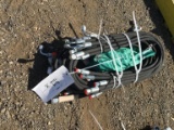 Bundle of Unused Hydraulic Hoses.