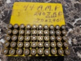 Lot of 44 AMP Auto Mag Bullets w/ Plastic Container