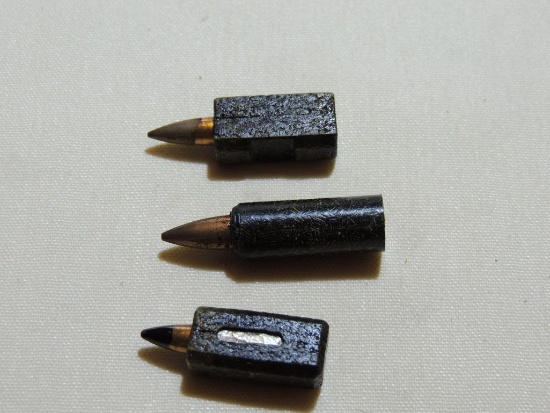 Three Heckler Caseless Cartridges