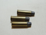 Three 32 Harrington & Richardson Magnum Cartridges